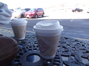 Sitting outside with our mocha at Arabica Coffee House.